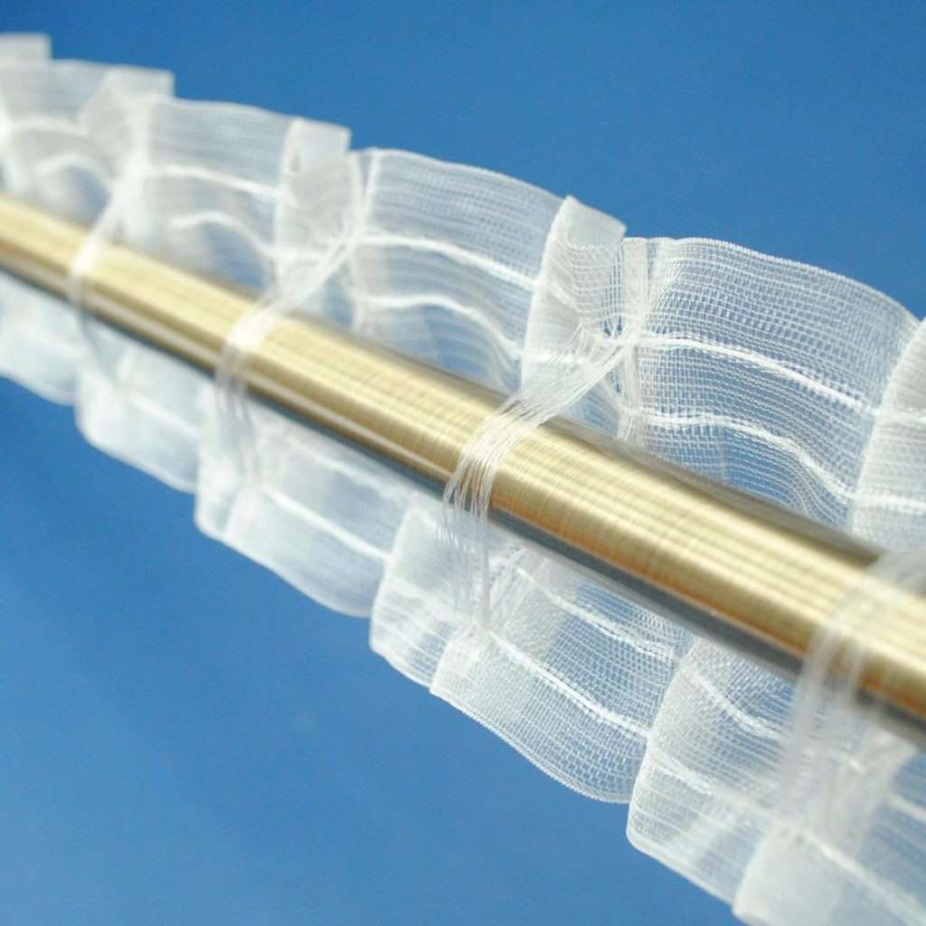 Taśma transparentna do firan zasłon Szerokość 8 cm Żyłkowe szelki do przełożenia karnisza rurowego Dodatkowo dwa rzędy kieszonek na agrafki umożliwiające pozostałe sposoby wieszania.